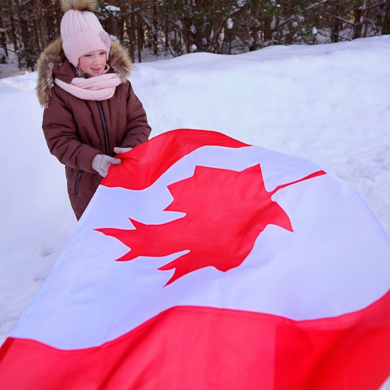 girl-with-canadian-flag-2022-11-07-05-56-03-utc-min